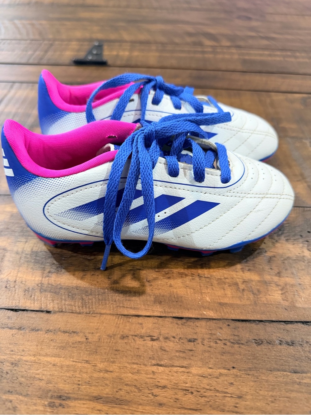 adidas Kids White Soccer Cleats with Blue Stripes and Pink Lining
